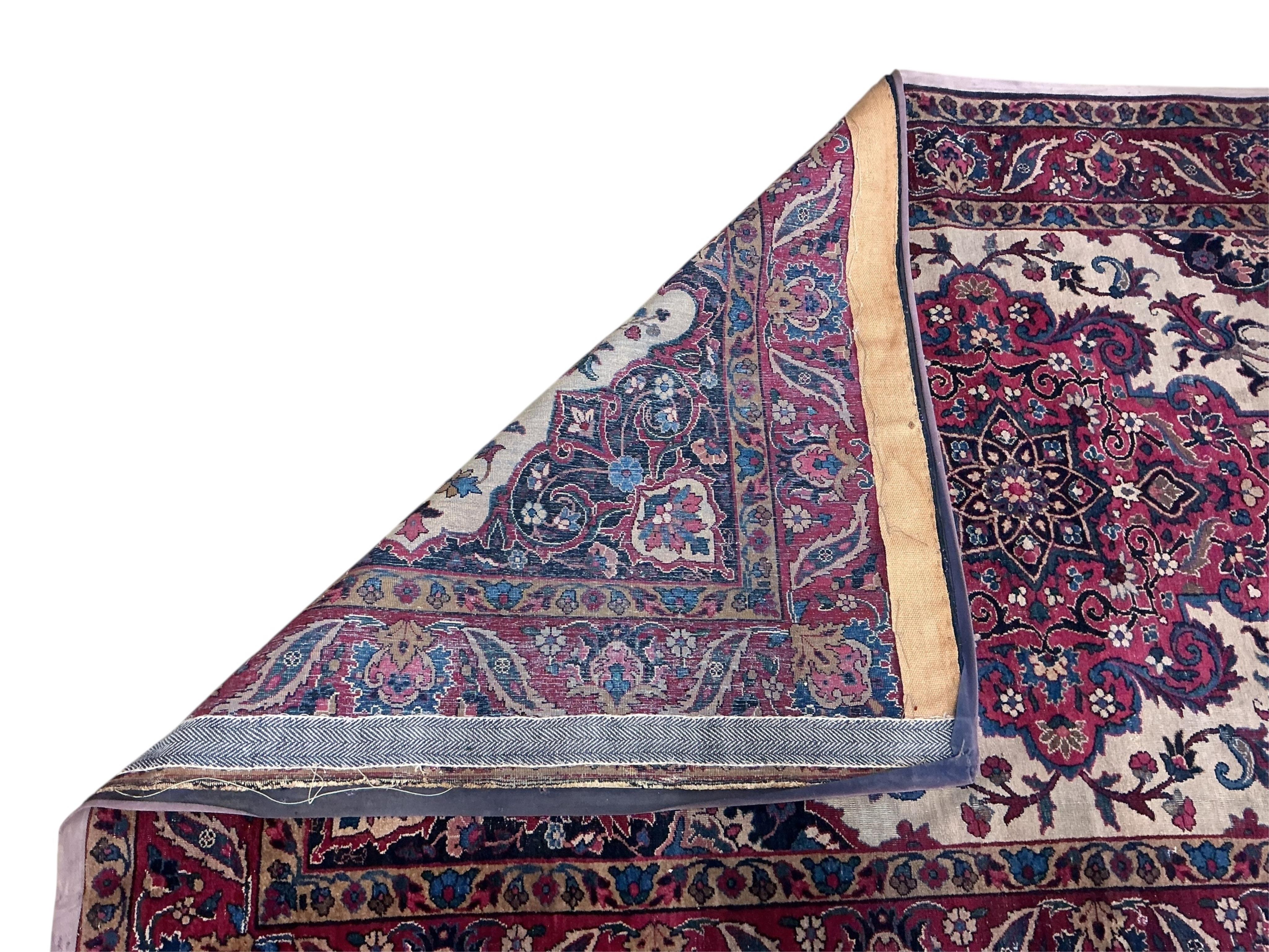 A Tabriz ivory ground rug, 208 x 125cm